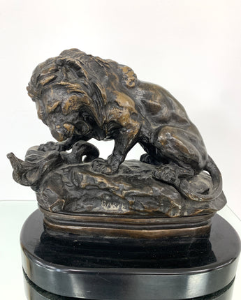 ANTOINE-LOUIS BARYE (FRENCH 1795-1875) BRONZE LION WITH SERPENT